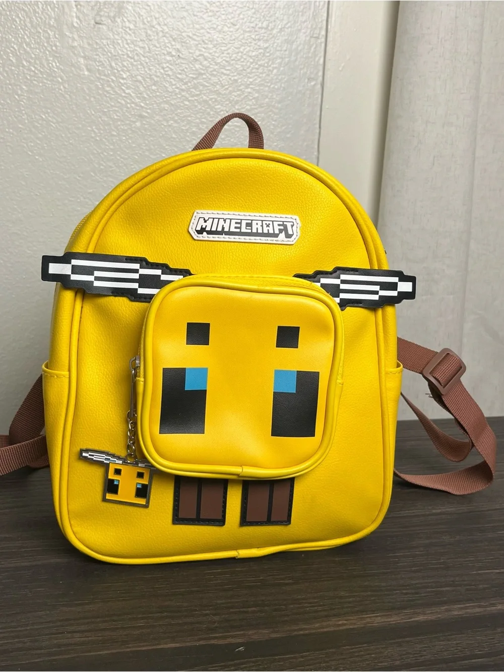Buzz Into Adventure: Iconic Minecraft Bee Mini Backpack for Gamers & Fans